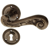 Jugendstil Zimmertürbeschlag aus Messing - organische Form - braun